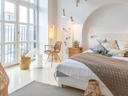 Stadler Form Eva humidifier in white in a big and bright bed room